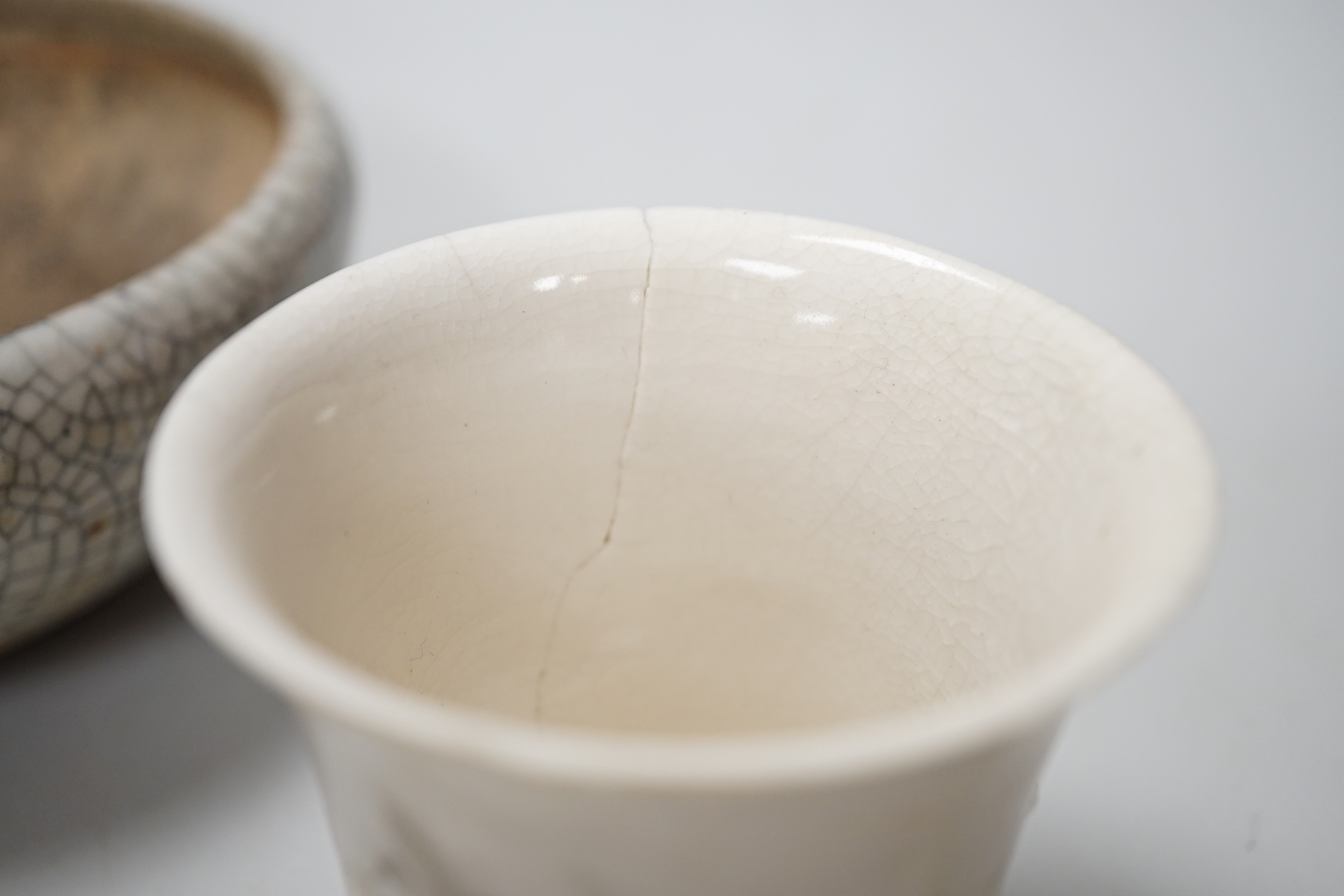 A Chinese crackleware bowl and a blanc de chine cup, bowl 14.5cm diameter
